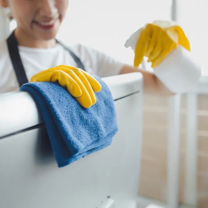 Close up of woman cleaning in the home