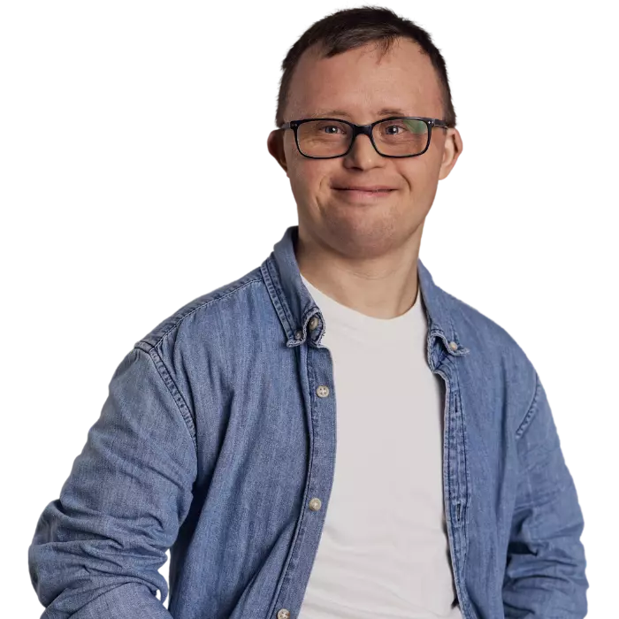 Happy man with down syndrome smiling at camera